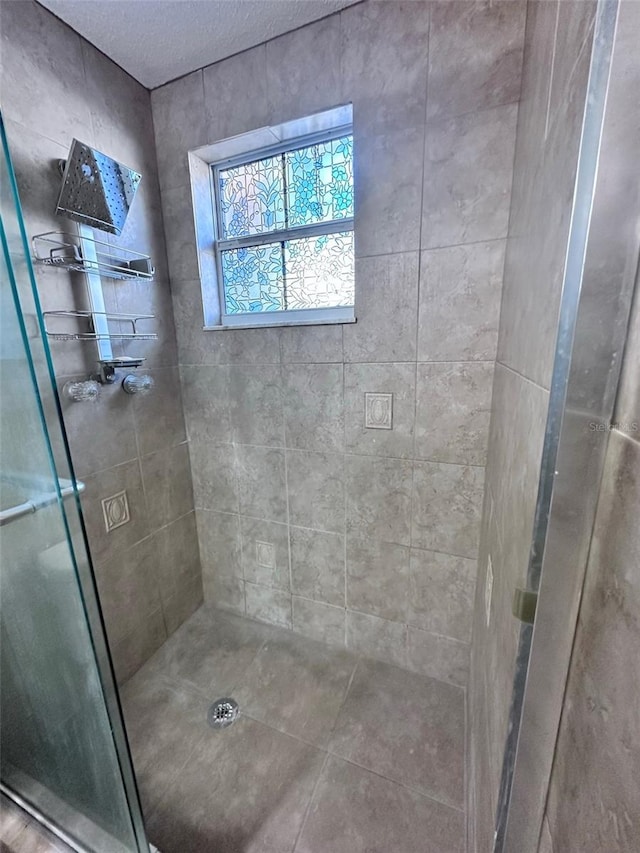 bathroom featuring a stall shower
