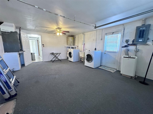 clothes washing area with electric water heater, a sink, washer and dryer, laundry area, and electric panel