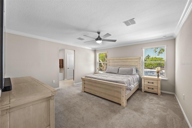 carpeted bedroom with a textured ceiling, visible vents, ornamental molding, and baseboards