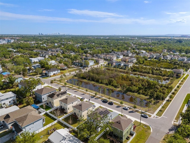 bird's eye view featuring a water view and a residential view