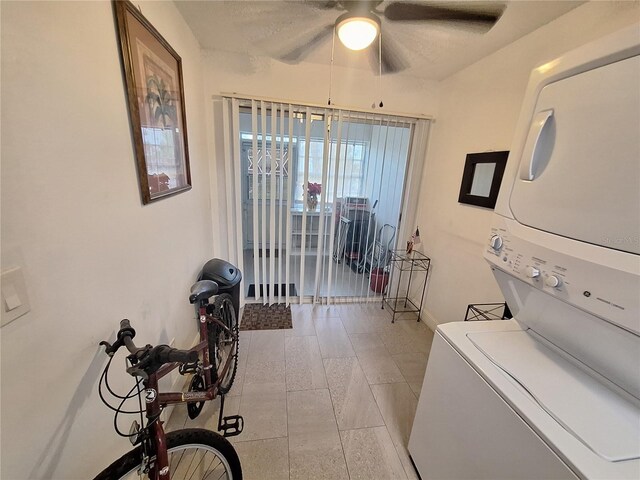 605 Brandy Wine Dr Unit 605, Largo, FL 33771 - laundry area featuring stacked washer and clothes dryer, laundry area, and a ceiling fan