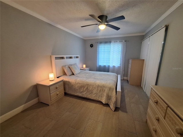 605 Brandy Wine Dr Unit 605, Largo, FL 33771 - bedroom with crown molding, light wood-style flooring, and a textured ceiling