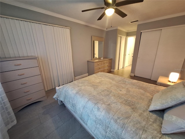 605 Brandy Wine Dr Unit 605, Largo, FL 33771 - bedroom with baseboards, visible vents, crown molding, and a ceiling fan