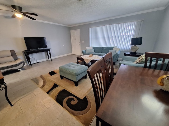 605 Brandy Wine Dr Unit 605, Largo, FL 33771 - living area featuring baseboards, a textured ceiling, a ceiling fan, and ornamental molding
