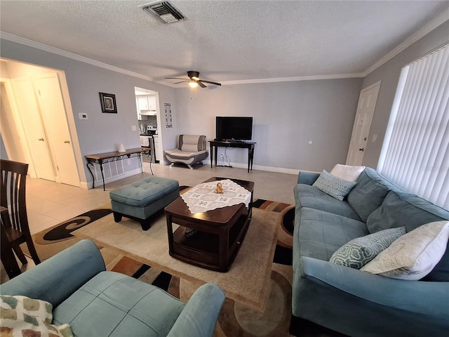 605 Brandy Wine Dr Unit 605, Largo, FL 33771 - living room featuring a textured ceiling, visible vents, crown molding, a ceiling fan, and light tile patterned floors