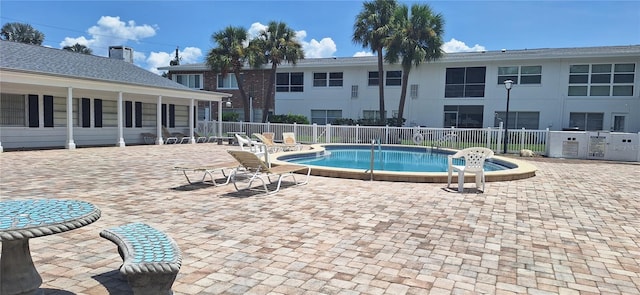 605 Brandy Wine Dr Unit 605, Largo, FL 33771 - pool featuring a patio area and fence