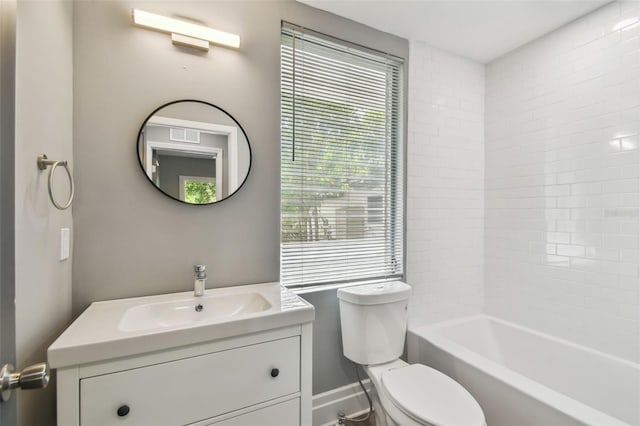3411 N 12th St, Tampa, FL 33605 - bathroom with baseboards, toilet, and vanity
