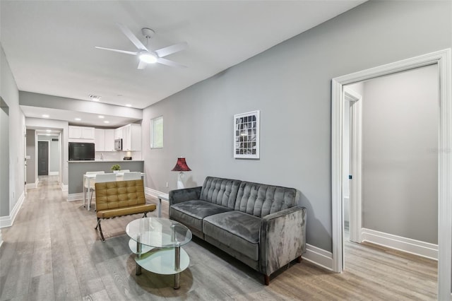 3411 N 12th St, Tampa, FL 33605 - living area with baseboards, ceiling fan, recessed lighting, and light wood-style floors