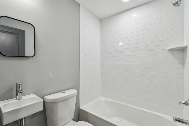 3411 N 12th St, Tampa, FL 33605 - full bathroom featuring shower / washtub combination, toilet, and a sink