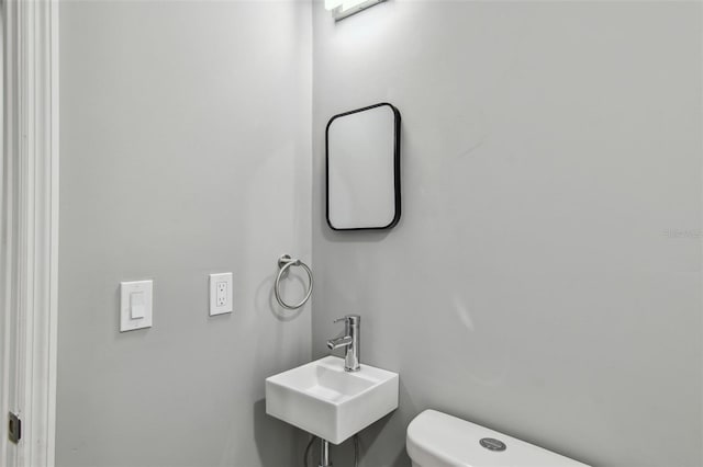 3411 N 12th St, Tampa, FL 33605 - bathroom featuring toilet and a sink