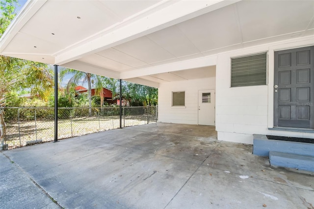 3411 N 12th St, Tampa, FL 33605 - view of patio / terrace featuring a carport, fence, and entry steps
