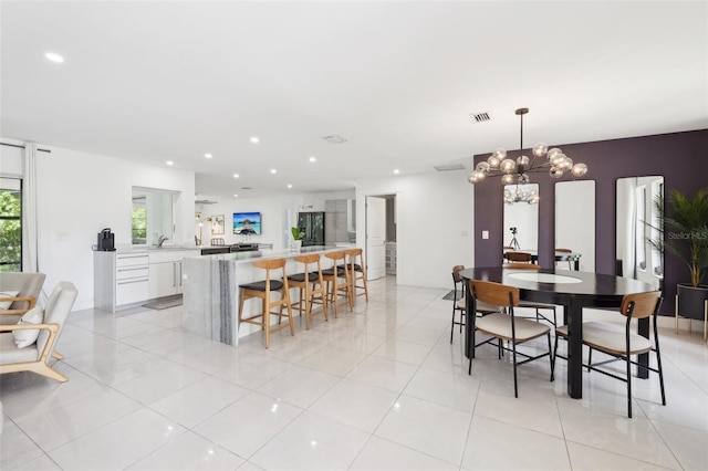 dining room featuring a chandelier, light tile patterned floors, visible vents, and recessed lighting