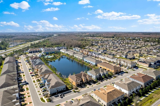 bird's eye view with a water view and a residential view