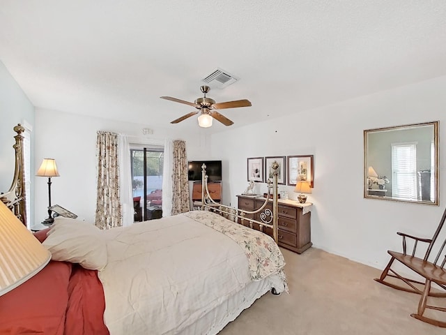 bedroom with light colored carpet, visible vents, ceiling fan, and access to outside