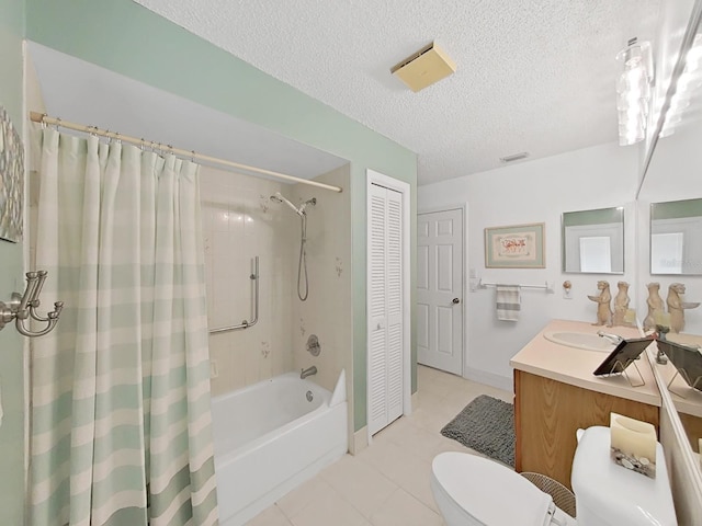 bathroom with vanity, shower / bathtub combination with curtain, toilet, a textured ceiling, and tile patterned floors