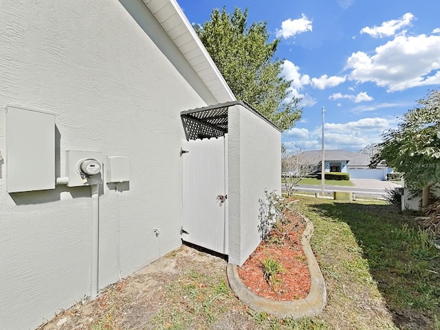 exterior space featuring stucco siding