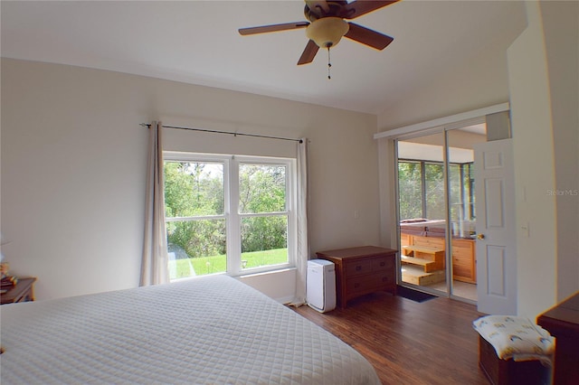 bedroom with a ceiling fan, access to outside, vaulted ceiling, and wood finished floors