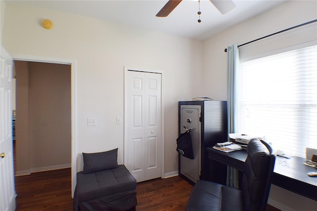 home office with baseboards, dark wood-style floors, and a ceiling fan