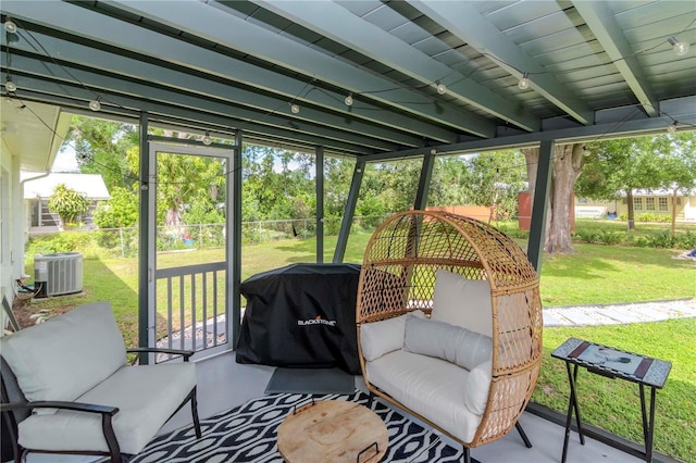 125 Siobhan Ave, Tampa, FL 33613 - sunroom / solarium featuring beam ceiling