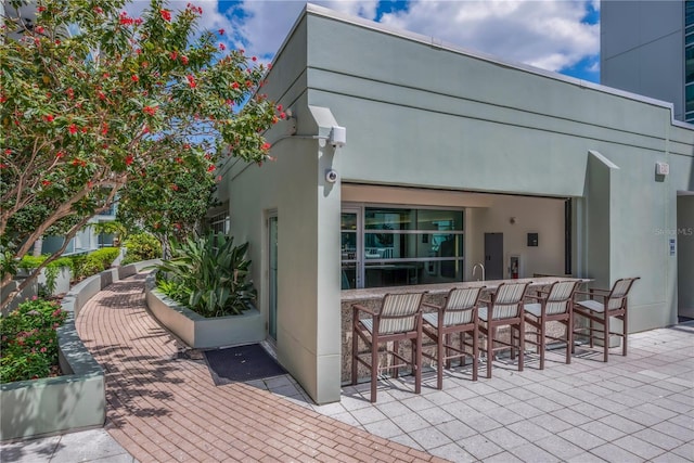 view of patio featuring outdoor dry bar
