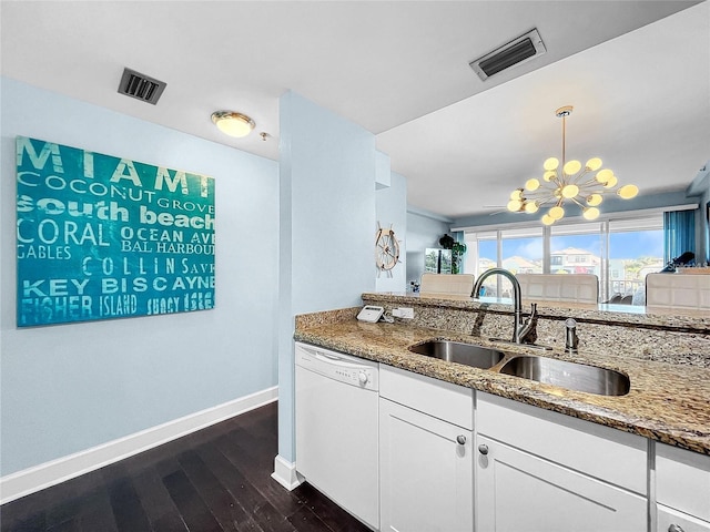 kitchen with dishwasher, a sink, baseboards, and stone counters