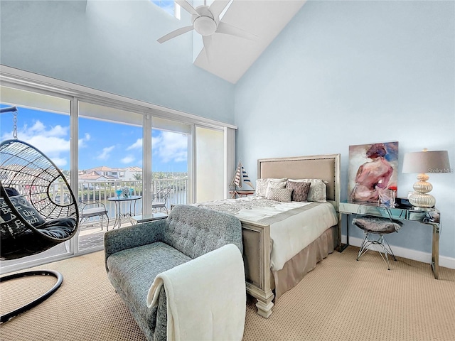 bedroom with high vaulted ceiling, access to exterior, light carpet, baseboards, and ceiling fan
