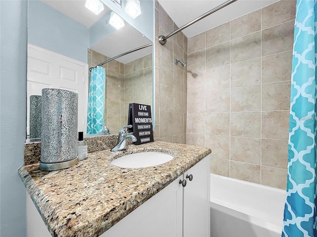 bathroom featuring vanity and shower / bath combo