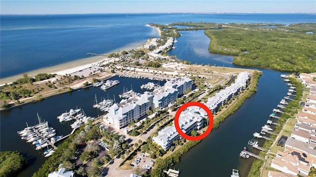 aerial view of property's location featuring a large body of water