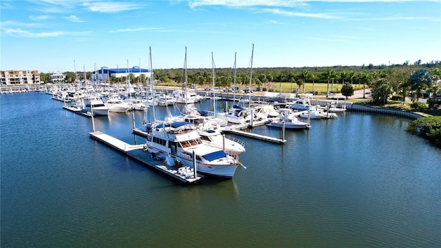dock featuring view of marina and a water view