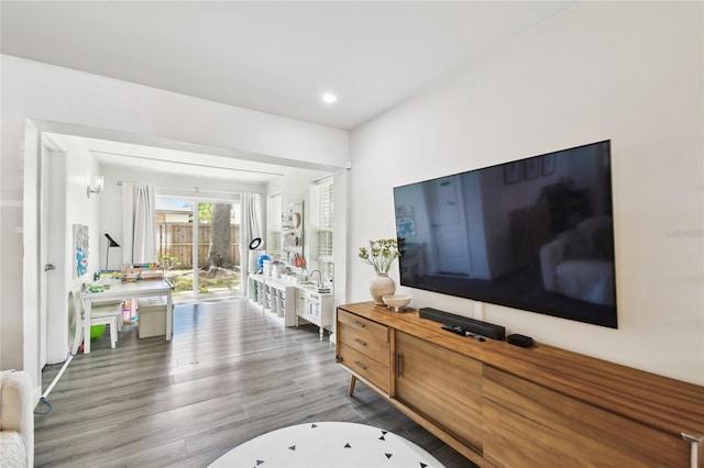 3202 W Coachman Ave, Tampa, FL 33611 - living room featuring wood finished floors and recessed lighting