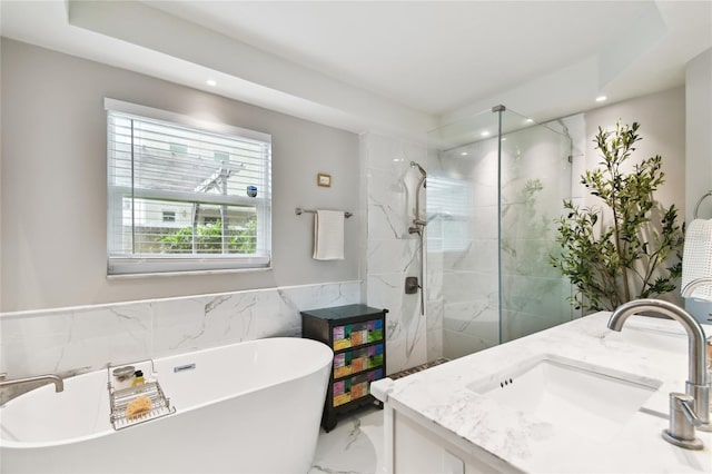 3202 W Coachman Ave, Tampa, FL 33611 - full bathroom with recessed lighting, a soaking tub, marble finish floors, vanity, and a marble finish shower