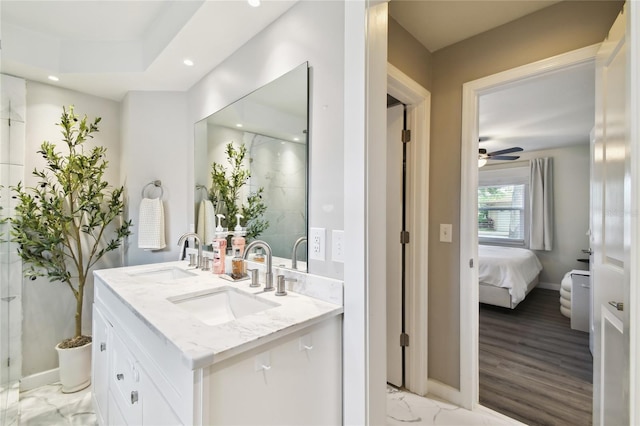 3202 W Coachman Ave, Tampa, FL 33611 - ensuite bathroom featuring double vanity, a marble finish shower, a ceiling fan, recessed lighting, and baseboards
