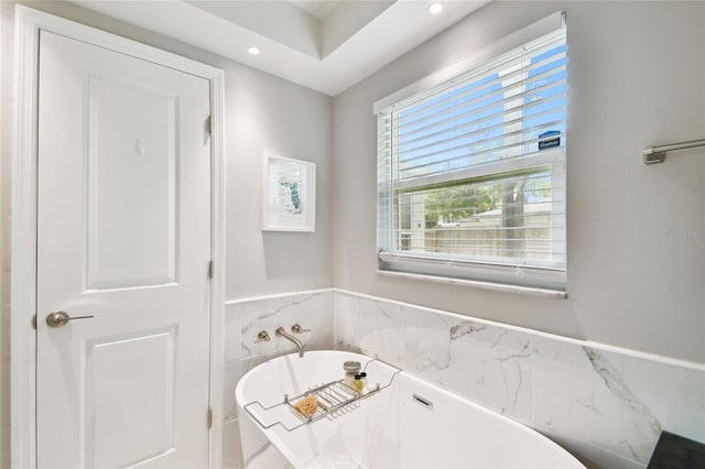 3202 W Coachman Ave, Tampa, FL 33611 - bathroom with a soaking tub and recessed lighting