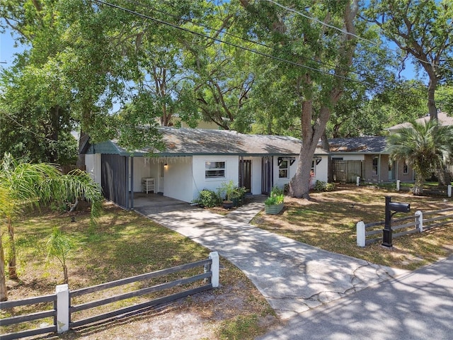 3202 W Coachman Ave, Tampa, FL 33611 - single story home with a fenced front yard and driveway