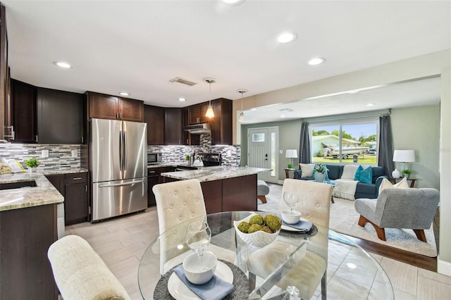 dining room featuring recessed lighting and visible vents