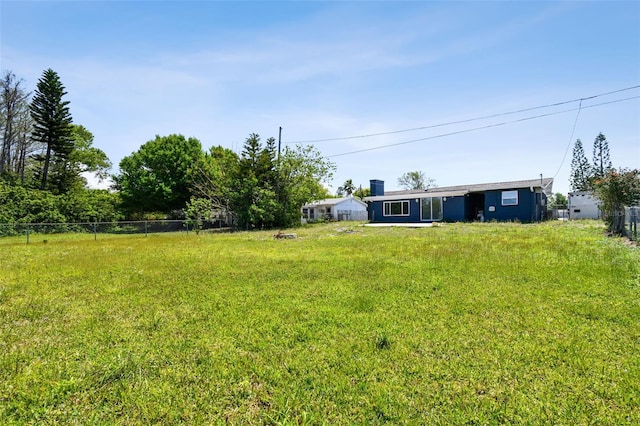 view of yard featuring fence
