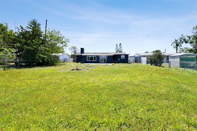 view of yard featuring fence