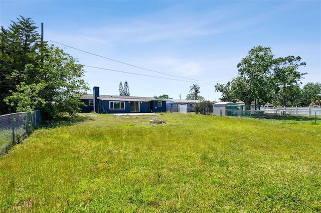 view of yard with fence