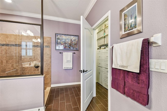 21627 Pearl Crescent Ct, Land O Lakes, FL 34637 - bathroom with baseboards, ornamental molding, wood finish floors, and walk in shower