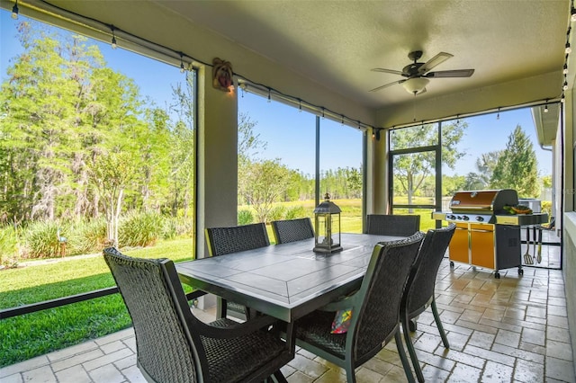 21627 Pearl Crescent Ct, Land O Lakes, FL 34637 - sunroom / solarium with stone tile floors and a textured ceiling