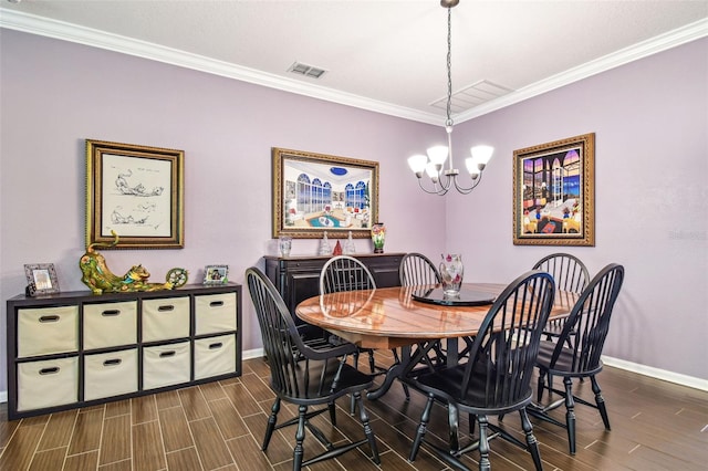 21627 Pearl Crescent Ct, Land O Lakes, FL 34637 - dining area featuring visible vents, baseboards, ornamental molding, and wood tiled floor