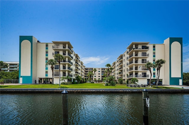 view of building exterior with a water view