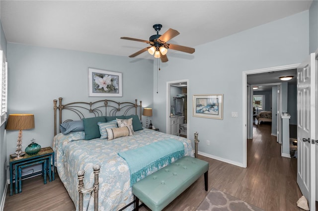 14723 Seminole Trl, Seminole, FL 33776 - bedroom featuring ceiling fan, vaulted ceiling, wood finished floors, baseboards, and ensuite bathroom