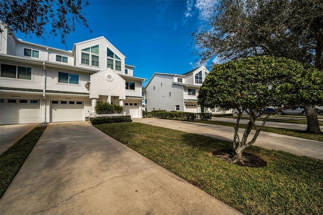 14723 Seminole Trl, Seminole, FL 33776 - view of front of home with an attached garage and driveway