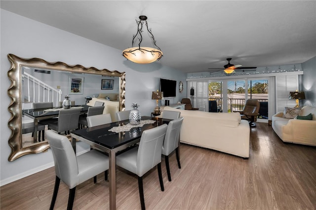 14723 Seminole Trl, Seminole, FL 33776 - dining room with ceiling fan and wood finished floors