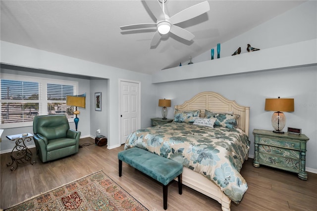 14723 Seminole Trl, Seminole, FL 33776 - bedroom featuring baseboards, wood finished floors, and vaulted ceiling