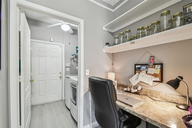 10442 Villa View Cir, Tampa, FL 33647 - clothes washing area featuring washer and clothes dryer, light wood-type flooring, laundry area, and a ceiling fan