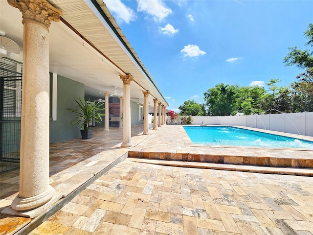 view of pool with a fenced backyard, a fenced in pool, and a patio