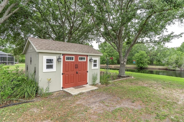 12304 Freesia Ct, Riverview, FL 33569 - view of shed featuring a water view