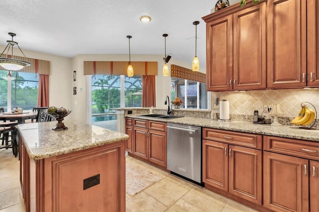 12304 Freesia Ct, Riverview, FL 33569 - kitchen featuring tasteful backsplash, brown cabinets, dishwasher, and a sink